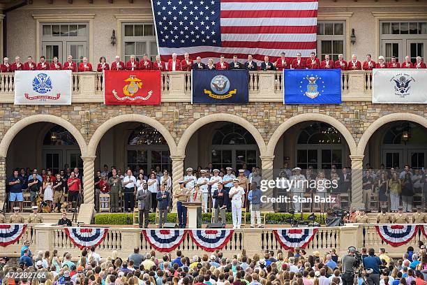 On center stage, from left, Jacksonville Mayor Alvin Brown, PGA TOUR Commissioner Tim Finchem, Sergeant Major Bryan Battaglia, Eagle Scout Adam...