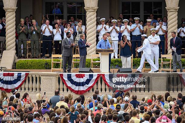 On stage, from left, Jacksonville Mayor Alvin Brown, PGA TOUR Commissioner Tim Finchem, golfer David Duval, Sergeant Major Bryan Battaglia, Erica...