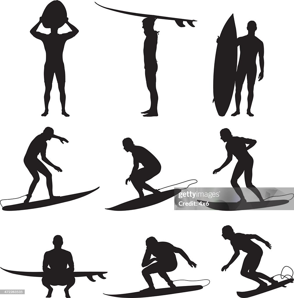 Awesome male surfers with surfboards