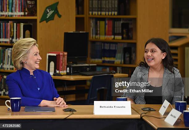 Democratic presidential candidate and former U.S. Secretary of State Hillary Clinton speaks with student Betsaida Frausto at Rancho High School on...