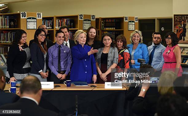 Democratic presidential candidate and former U.S. Secretary of State Hillary Clinton poses with students, faculty and U.S. Rep. Dina Titus after...