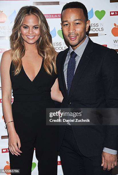 Chrissy Teigen and John Legend attend the Wellness In The Schools 10th Anniversary Gala at Riverpark on May 5, 2015 in New York City.