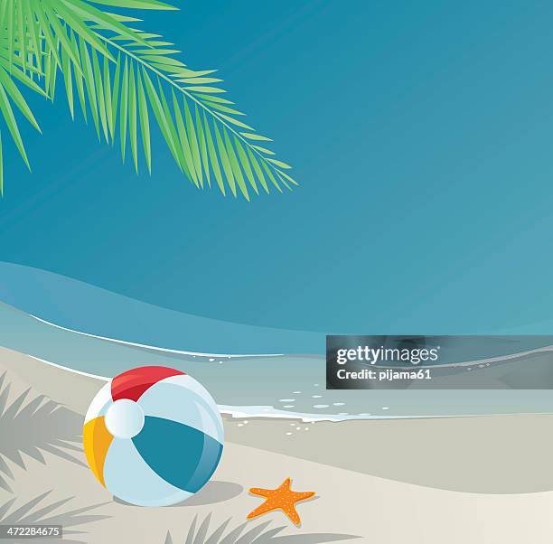 beach ball - red sand background stock illustrations
