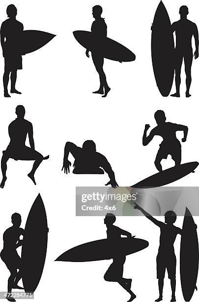 silhouette surfer surfen und hält surfboards - auf den kopf gestellt stock-grafiken, -clipart, -cartoons und -symbole