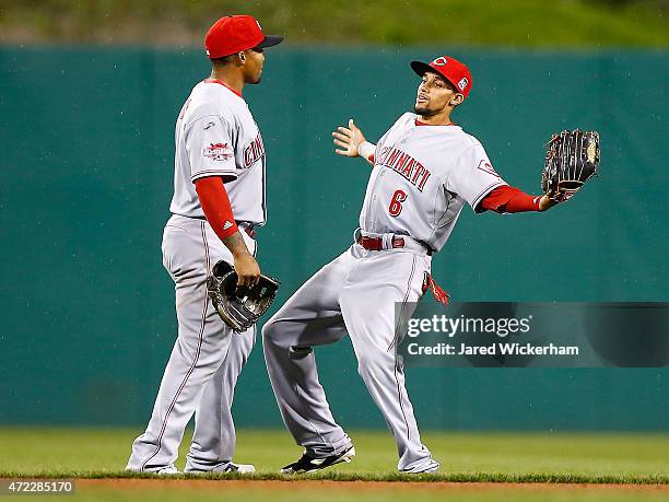 Billy Hamilton and Marlon Byrd celebrate their win against the Pittsurgh Pirates of the Cincinnati Reds during the game at PNC Park on May 5, 2015 in...