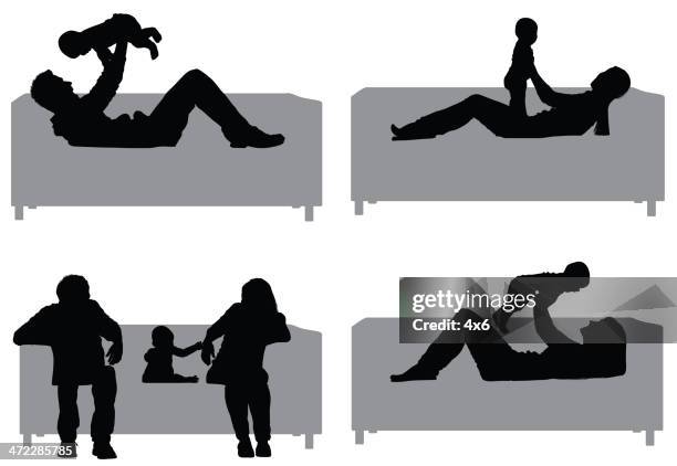 parents with baby - baby lying on back stock illustrations