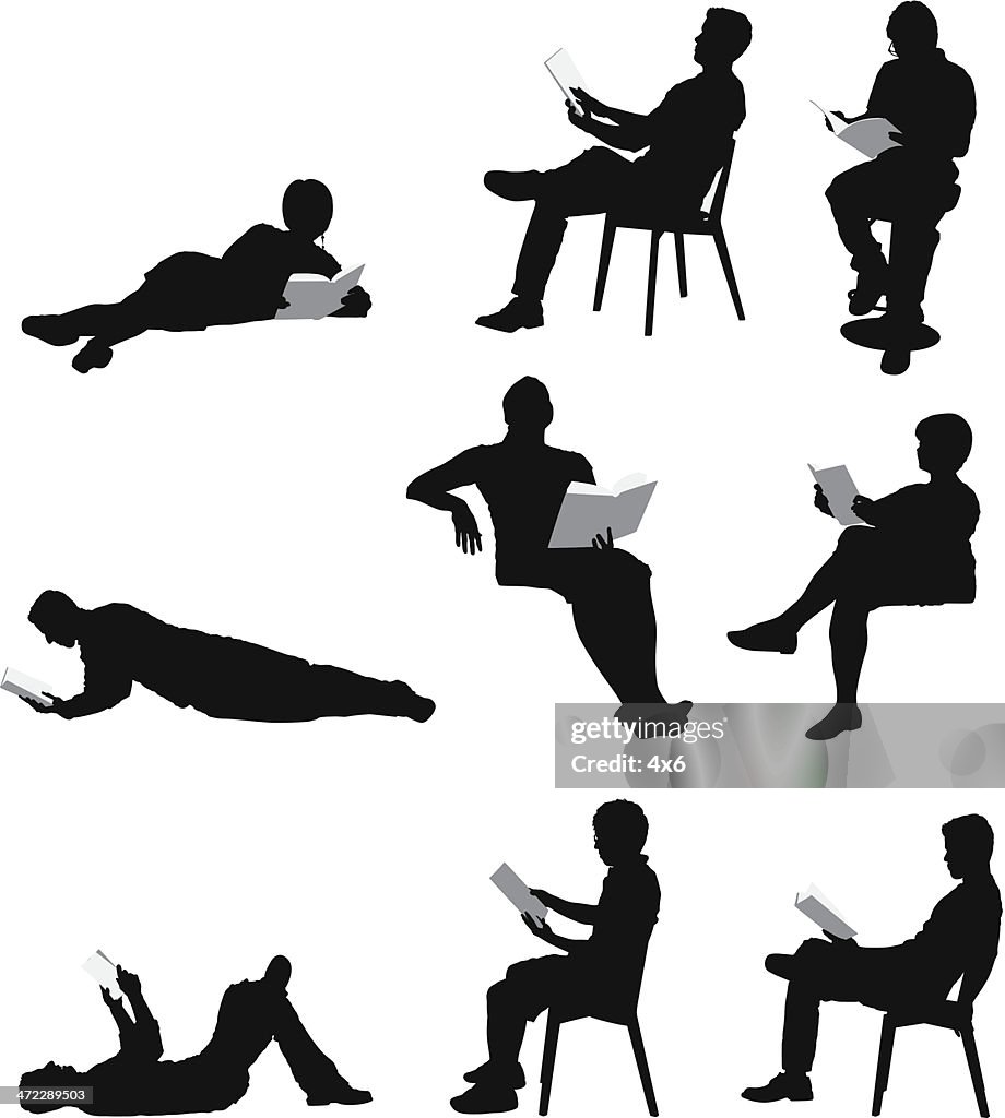 Silhouette of people reading books