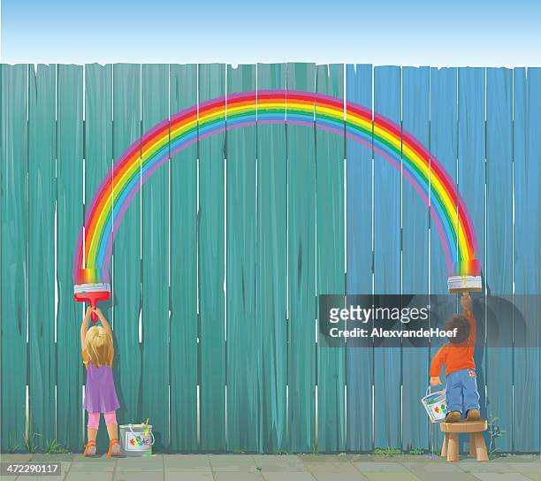 two kids painting a rainbow on fence - children painting stock illustrations
