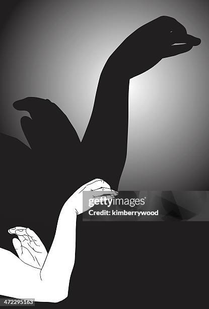 shadow puppet swan - shadow puppet stock illustrations