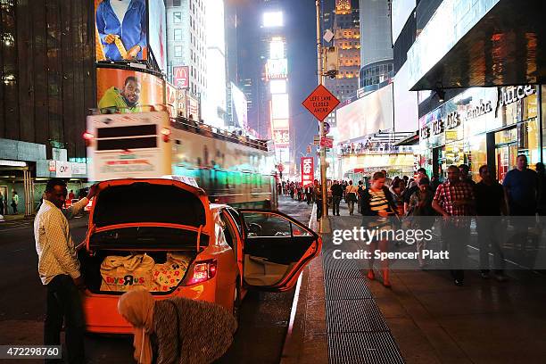 Light drenched Times Square on May 5, 2015 in New York City. In an effort to reduce Manhattan's carbon footprint, New York's City Council is...