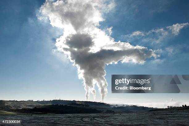 Steam billows from the cooling towers of the Yallourn coal-fired power station operated by EnergyAustralia Holdings Ltd., a unit of CLP Holdings...