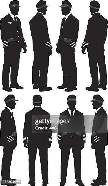 multiple silhouettes of a pilot - pilot uniform stock illustrations