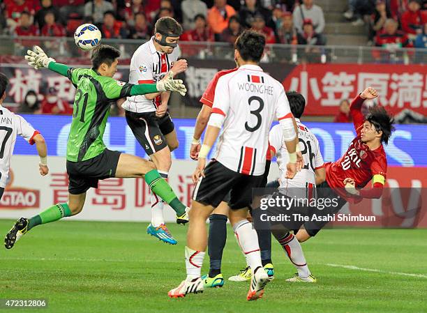 Gaku Shibasaki of Kashima Antlers scores his team's second goal during the AFC Champions League Group H match between Kashima Antlers and FC Seoul at...