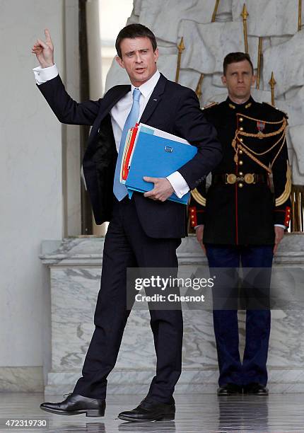 French Prime minister, Manuel Valls leaves the Elysee Palace after the weekly cabinet meeting on May 06, 2015 in Paris, France.