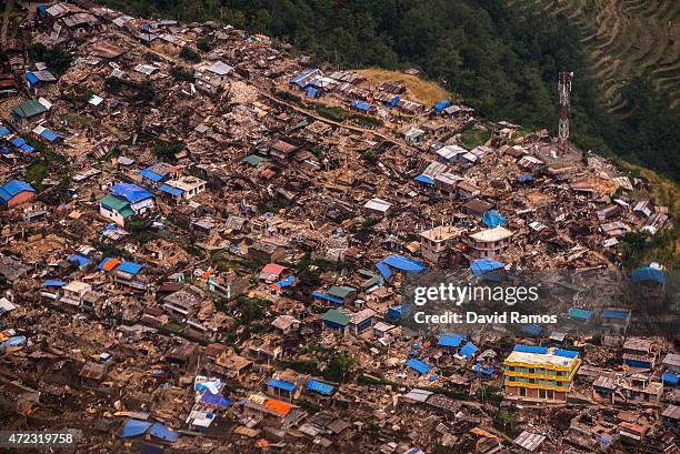 Damaged houses are seen from an Indian Helicopter on May 6, 2015 in Barpak, Nepal. A major 7.9 earthquake hit Kathmandu mid-day on Saturday 25th...