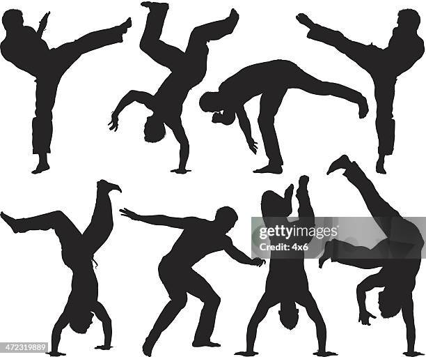 multiple silhouettes of a man practicing capoeira - capoeira stock illustrations