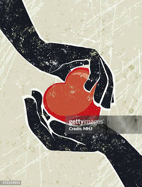 hand's cradling a heart - hands embracing stock illustrations