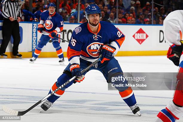 Tyler Kennedy of the New York Islanders skates against the Washington Capitals during Game Three of the Eastern Conference Quarterfinals during the...