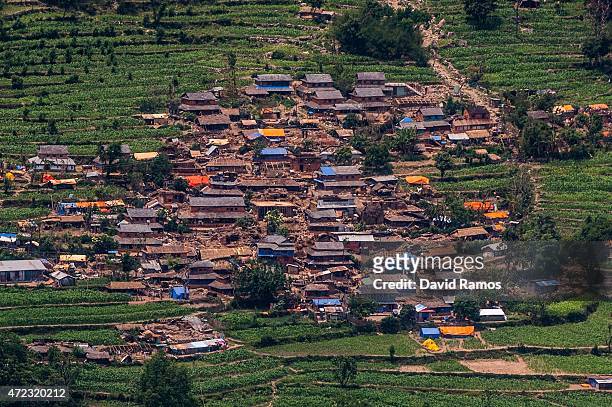 Damaged houses are seen in a village from an Indian Helicopter on May 6, 2015 near Gorkha, Nepal. A major 7.9 earthquake hit Kathmandu mid-day on...