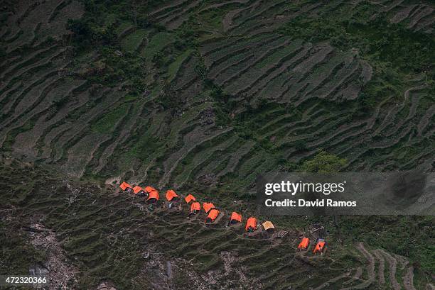 Makeshift shelters are seen from an Indian helicopter on May 6, 2015 in Hulchuk, Nepal. A major 7.9 earthquake hit Kathmandu mid-day on Saturday 25th...