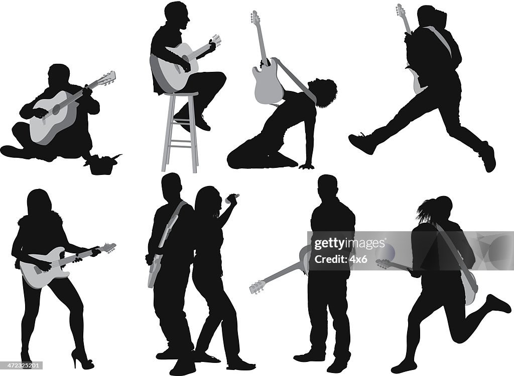 Silhouettes of people playing guitar