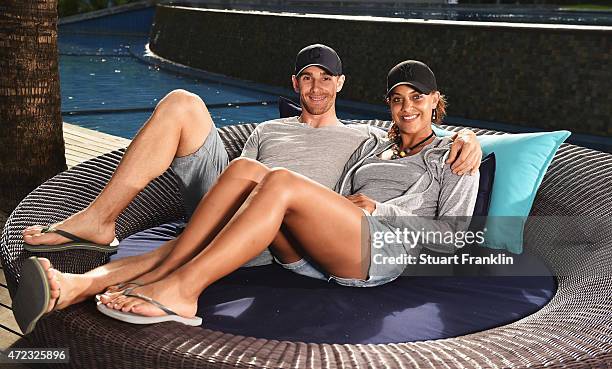 Estanislao Goya of Argentina relaxes with his girlfriend and Ladies European Tour golfer Henrietta Zuel of England prior to the start of the AfrAsia...