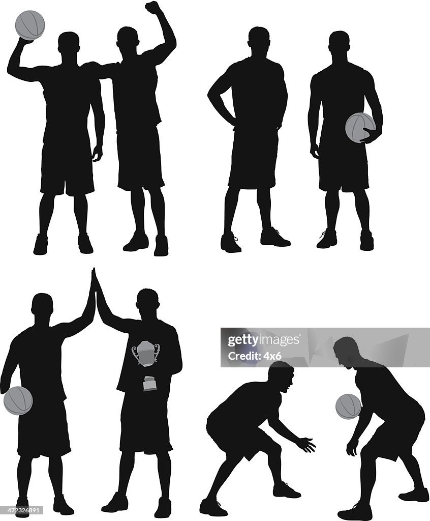 Silhouettes of basketball players