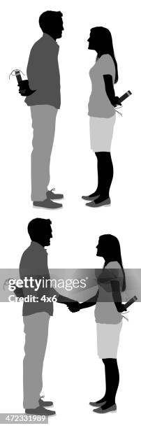 couple with dynamite sticks behind them - cheating relationship stock illustrations
