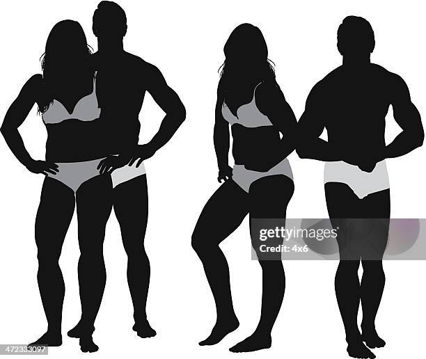 couple posing in undergarments - couple facing camera stock illustrations