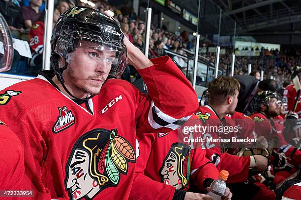 Paul Bittner of Portland Winterhawks sits on the bench against the Kelowna Rockets during game 5 of the Western Conference Final on May 1, 2015 at...