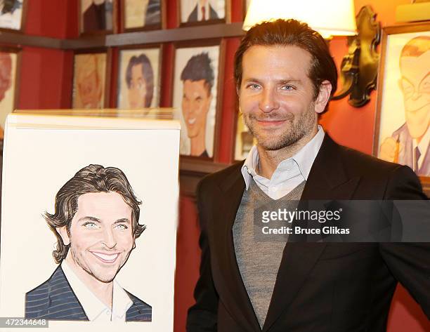 Bradley Cooper gets honored with a Sardi's Caricature in honor of his performance as "John Merrick" in "The Elephant Man" on Broadway at the...