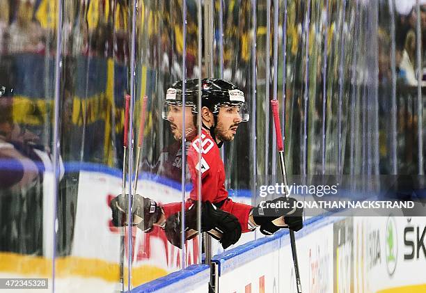 Forward Denis Hollenstein of Switzerland steps out of the penalty box during the group A preliminary round match Switzerland vs Latvia at the 2015...