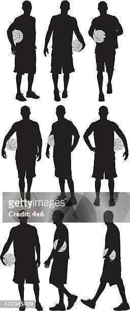 multiple silhouettes of a basketball player - basketball player stock illustrations