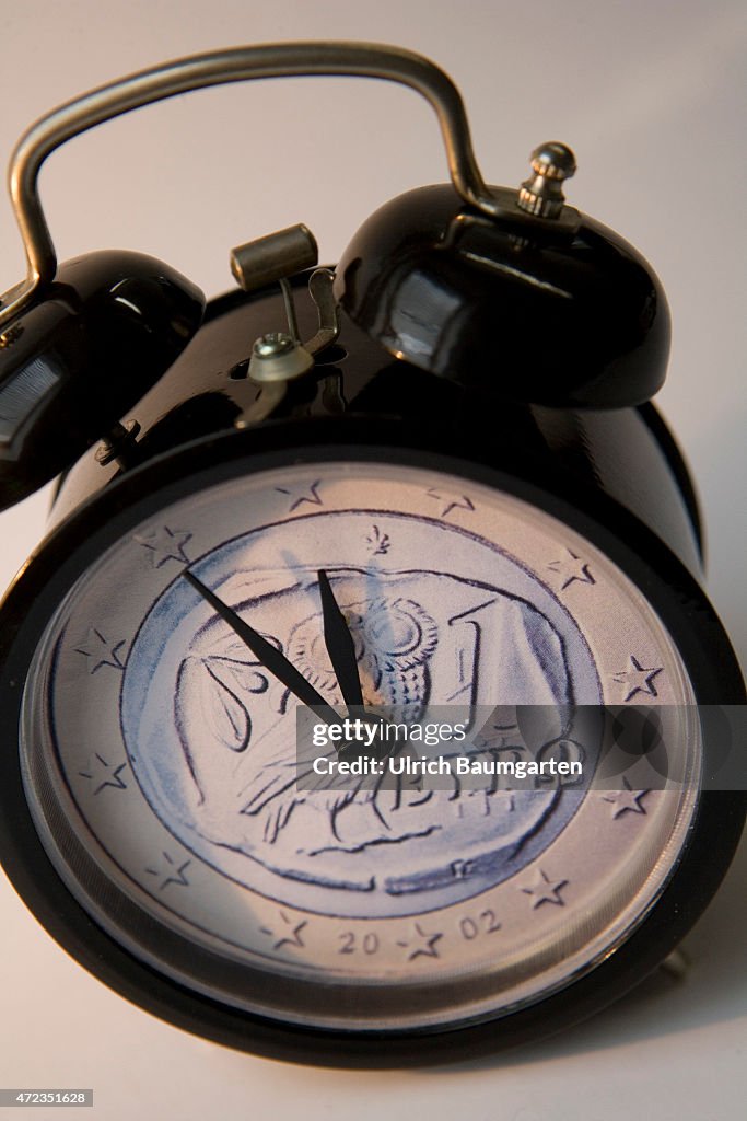 Alarm clock, Greek 1 Euro coin as a clock face.