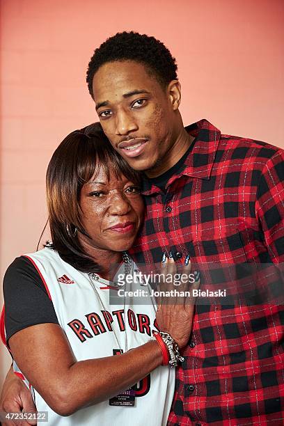 Mothers: Closeup portrait of Toronto Raptors shooting guard DeMar DeRozan casual, posing with his mom Diane DeRozan during photo shoot at Air Canada...