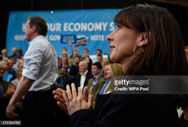 Samantha Cameron claps as her husband Britain's Prime Minister David Cameron addresses his campaign rally for the General Election at the Harris &...