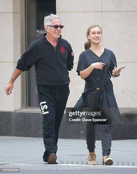 Jeffrey Epstein walking around with a mystery women May 5, 2015 in New York City.