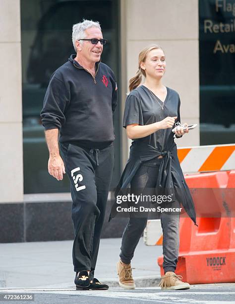 Jeffrey Epstein walking around with a mystery women May 5, 2015 in New York City.