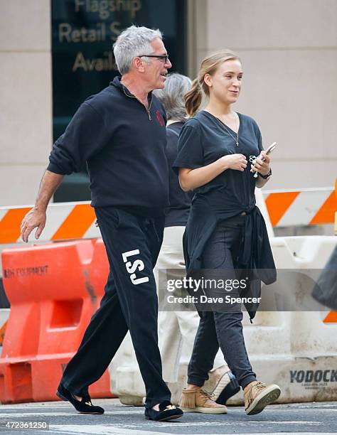 Jeffrey Epstein walking around with a mystery women May 5, 2015 in New York City.