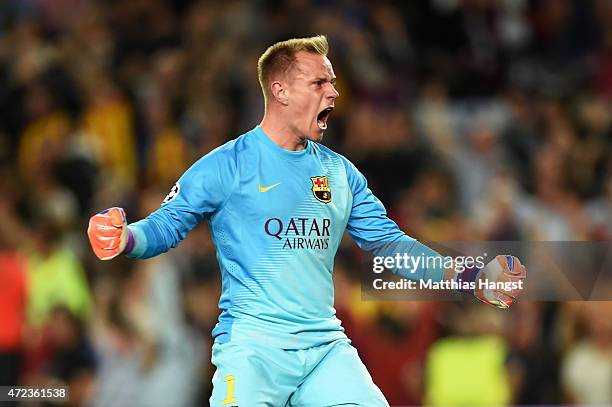 Goalkeeper Marc-Andre ter Stegen of Barcelona celebates as teammate Lionel Messi scores the opening goal during the UEFA Champions League Semi Final,...