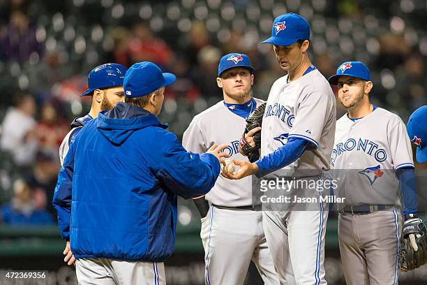 Manager John Gibbons of the Toronto Blue Jays removes relief pitcher Jeff Francis of the Toronto Blue Jays during the sixth inning against the...