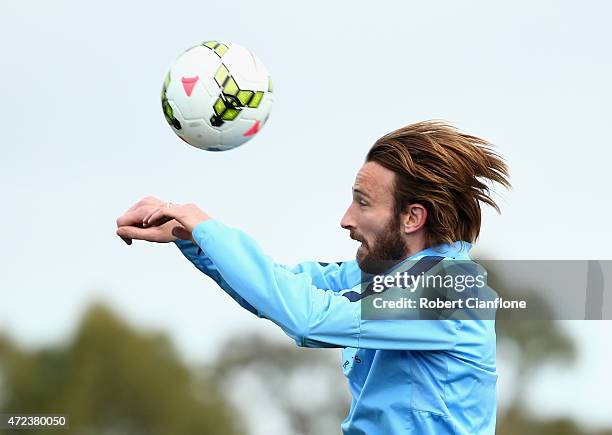 Josh Kennedy of Melbourne City heads the ball during a Melbourne City FC A-League training session at City Football Academy on May 7, 2015 in...