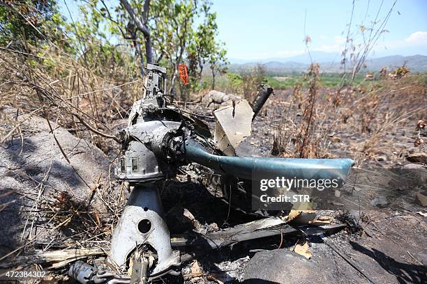 View of the remains of the Mexican military helicopter Cougar EC725 in Villa Vieja community, Villa Purificacion, Jalisco State, on May 06, 2015. A...