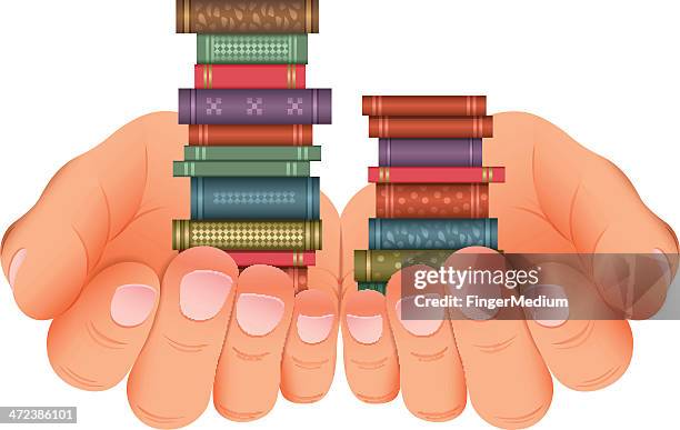 Book Stack Hand Photos and Premium High Res Pictures - Getty Images