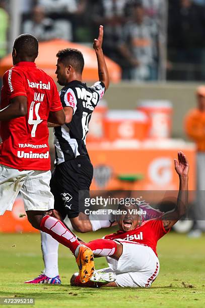Rafael Carioca of Atletico MG and Jorge Henrique of Internacional battle for the ball during a match between Atletico MG and Internacional as part of...