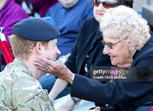 Prince Harry meets Daphne Dunne during a walkabout outside the Sydney Opera House on May 7, 2015 in Sydney, Australia. Prince Harry is visiting...