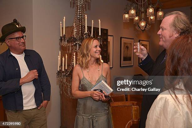 Obsolete owner Ray Azoulay, actress-author Maria Bello and manager John Carrabino attend the party for Maria Bello's book "Whatever...Love is Love"...