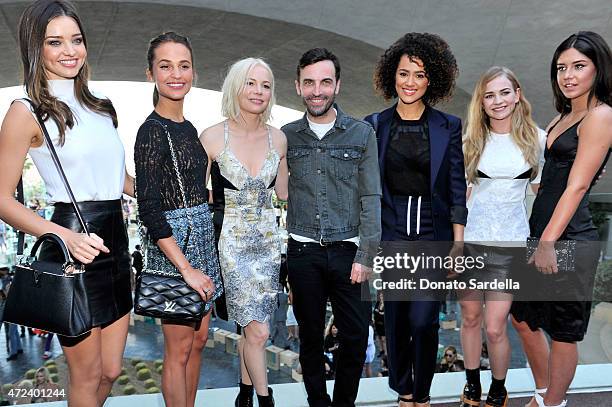 Model Miranda Kerr actresses Alicia Vikander and Michelle Williams, designer Nicolas Ghesquiere and actresses Nathalie Emmanuel, Britt Robertson, and...