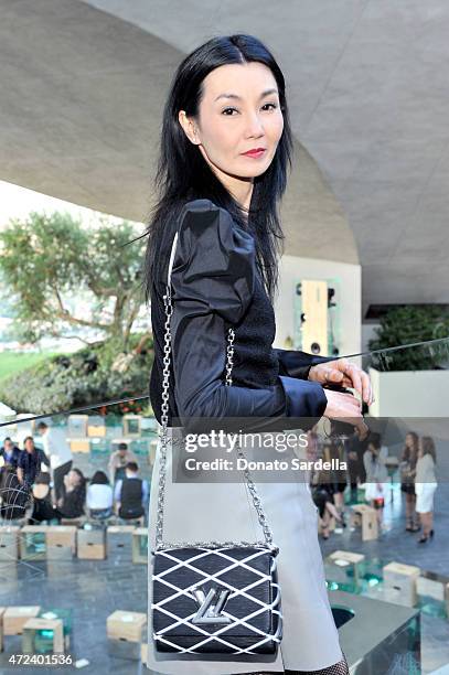 Actress Maggie Cheung backstage at the Louis Vuitton Cruise 2016 Resort Collection shown at a private residence on May 6, 2015 in Palm Springs,...