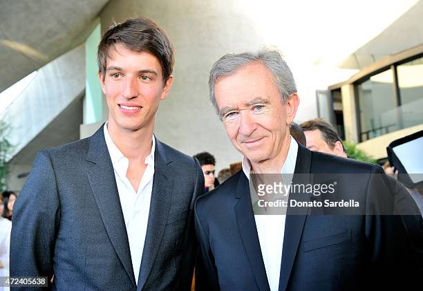 Alexandre Arnault and Chairman and Chief Executive Officer Bernard Arnault attend the Louis Vuitton Cruise 2016 Resort Collection shown at a private...